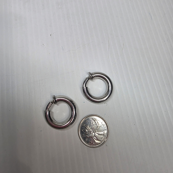 Silver toned puffy hoop huggie clip on retractable comfort Earrings - Picture 7 of 11